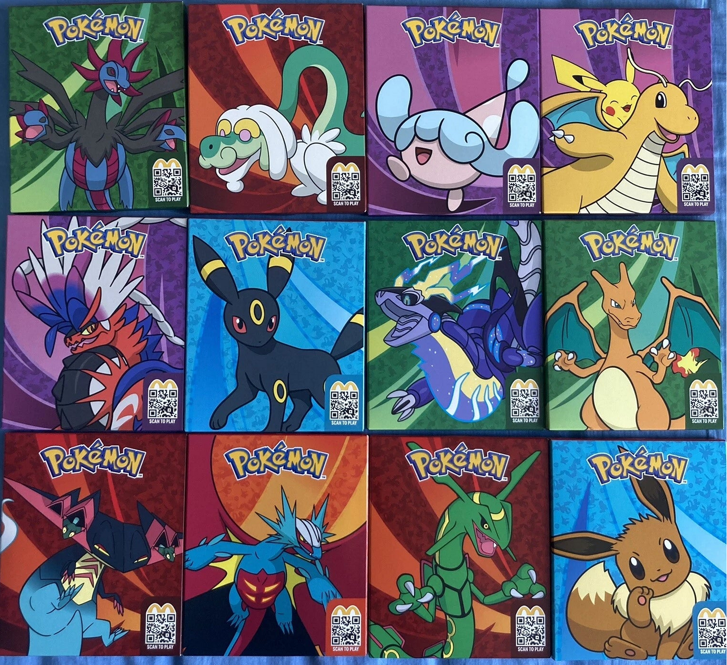 Pokemon Dragon Discovery 2025 McDonald's Happy Meal Box- caja al azar